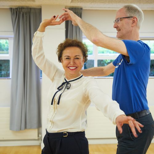 Couple dancing in dance studio