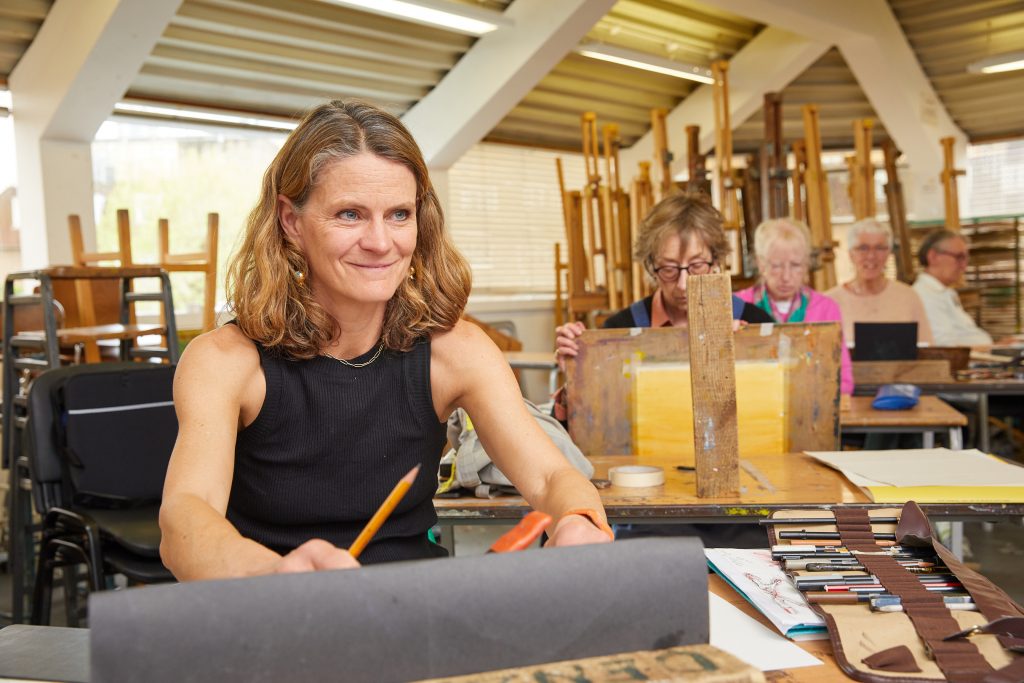 Women in art studio sketching