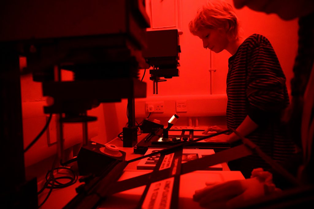 Women in dark room of photography studio