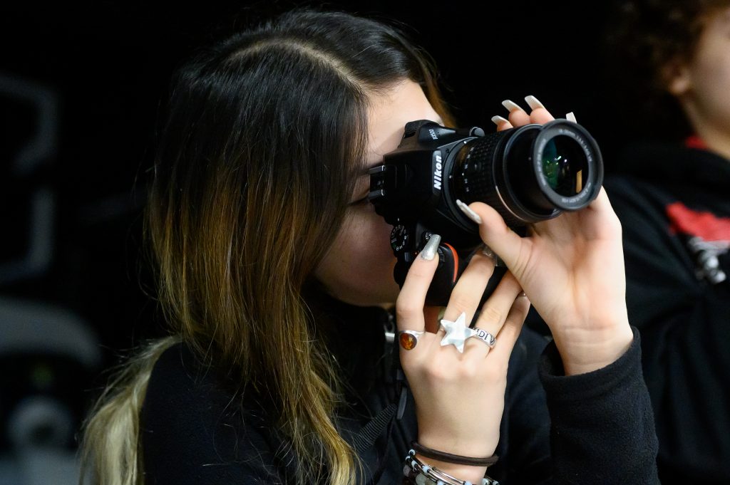 Girl holding camera